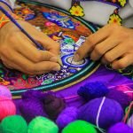 The process of hours of dedication in making huichol art pieices.